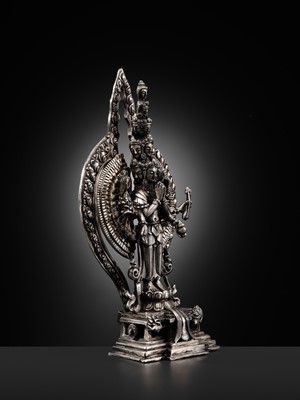 Lot 34 - A SILVER FIGURE OF AVALOKITESHVARA SAHASRABHUJA EKADASAMUKHA