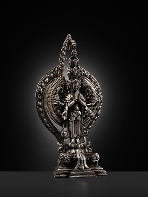 Lot 34 - A SILVER FIGURE OF AVALOKITESHVARA SAHASRABHUJA EKADASAMUKHA