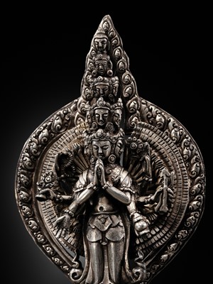 Lot 34 - A SILVER FIGURE OF AVALOKITESHVARA SAHASRABHUJA EKADASAMUKHA