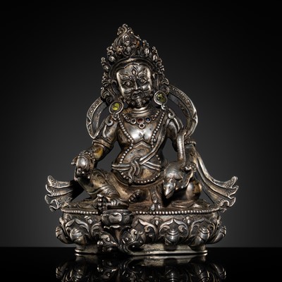 Lot 326 - A SILVER FIGURE OF JAMBHALA, TIBETAN-CHINESE, 19TH-EARLY 20TH CENTURY