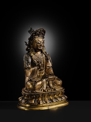 Lot 28 - A TWO-TONE GILT COPPER-ALLOY FIGURE OF GUANYIN, KANGXI-YONGZHENG PERIOD