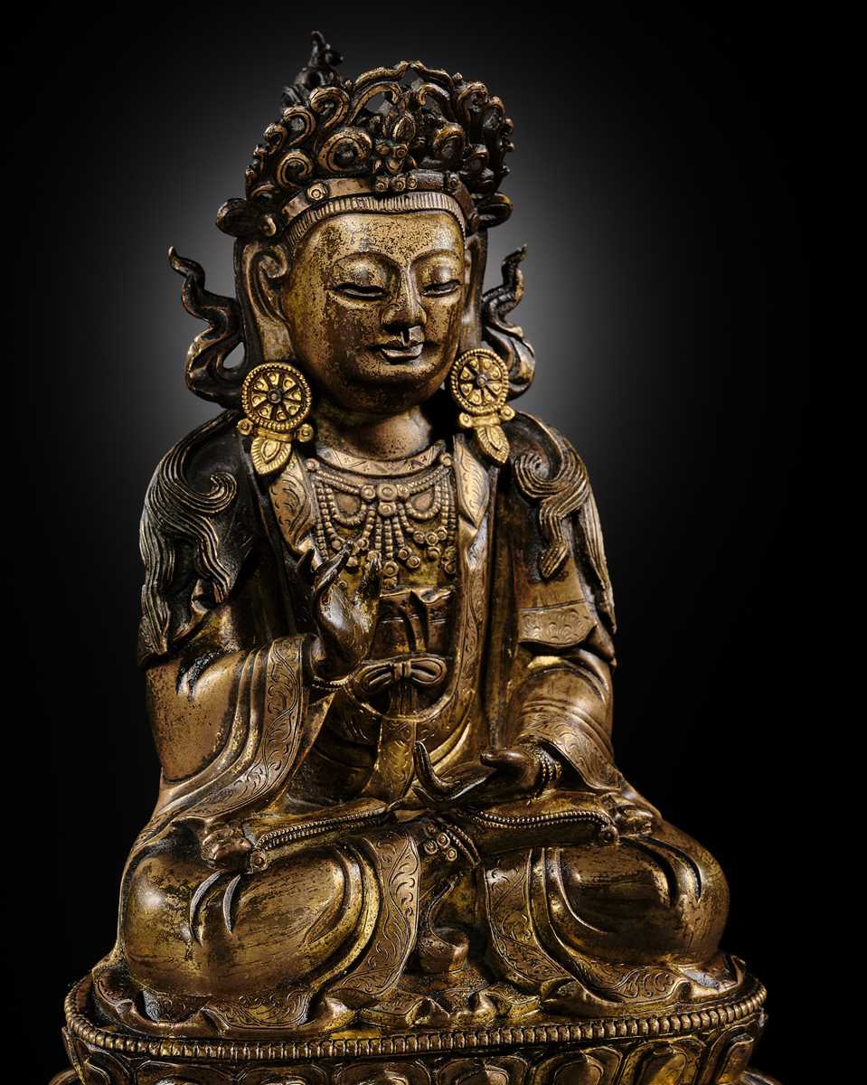 Lot 28 - A TWO-TONE GILT COPPER-ALLOY FIGURE OF GUANYIN, KANGXI-YONGZHENG PERIOD