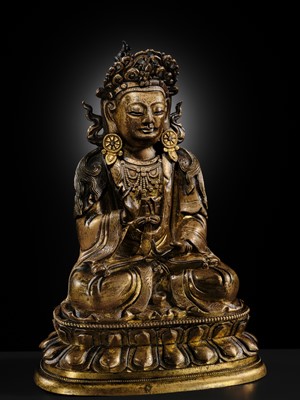 Lot 28 - A TWO-TONE GILT COPPER-ALLOY FIGURE OF GUANYIN, KANGXI-YONGZHENG PERIOD