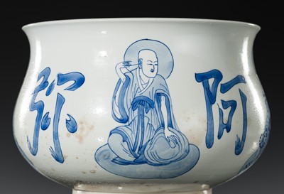 AN INSCRIBED BLUE AND WHITE ‘LUOHAN’ CENSER, KANGXI PERIOD