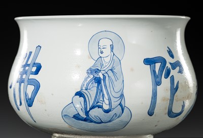 AN INSCRIBED BLUE AND WHITE ‘LUOHAN’ CENSER, KANGXI PERIOD