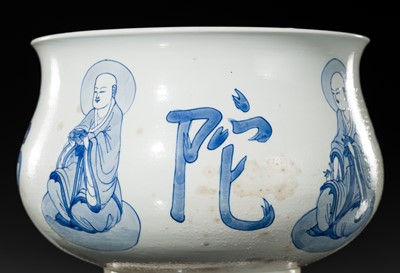 AN INSCRIBED BLUE AND WHITE ‘LUOHAN’ CENSER, KANGXI PERIOD