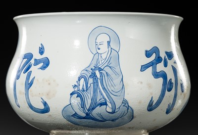 AN INSCRIBED BLUE AND WHITE ‘LUOHAN’ CENSER, KANGXI PERIOD
