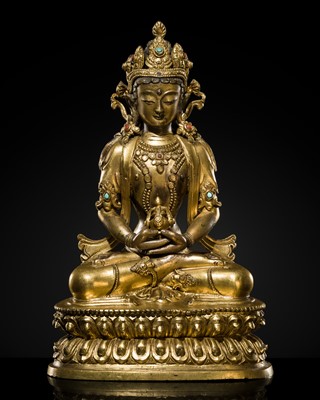 Lot 29 - A FINELY INLAID GILT-BRONZE FIGURE OF AMITAYUS, EARLY QING DYNASTY