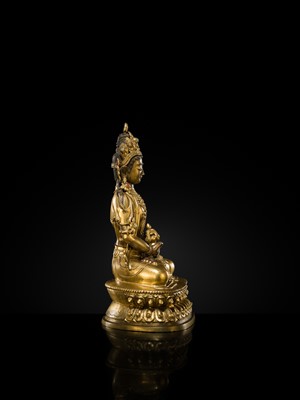 Lot 29 - A FINELY INLAID GILT-BRONZE FIGURE OF AMITAYUS, EARLY QING DYNASTY