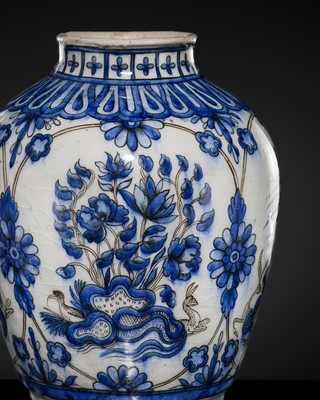 Lot 583 - AN EXQUISITELY PAINTED SAFAVID BLUE AND WHITE POTTERY JAR, IRAN, 17TH CENTURY