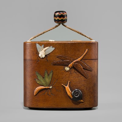 HIGASHIYAMA: AN INLAID WOOD TONKOTSU DEPICTING A SNAKE AND INSECTS