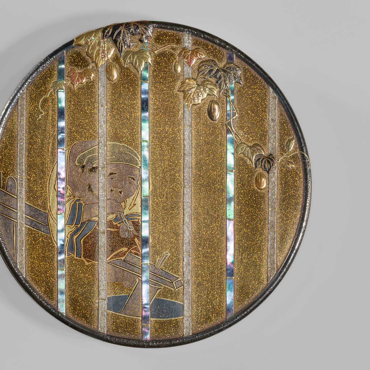 Lot 301 - SHIBATA ZESHIN (1807-1891): A MASTERFUL INLAID LACQUER KOGO (INCENSE BOX) DEPICTING DAIKOKU TAKING A SMOKING BREAK