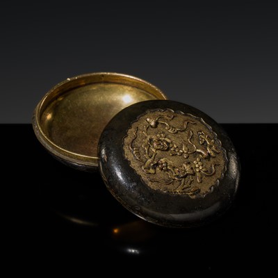 Lot 383 - A SAWASA ‘SQUIRREL AND GRAPEVINES’ PARCEL-GILT BRONZE BOX AND COVER, 17TH-18TH CENTURY