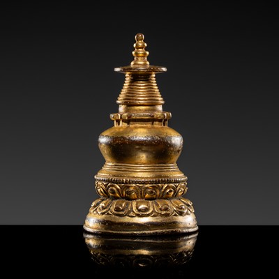 Lot 271 - A SMALL GILT-COPPER ALLOY STUPA, TIBET, 15TH-16TH CENTURY