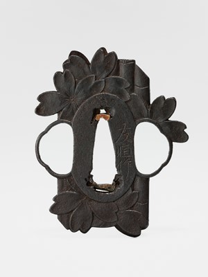 Lot 59 - NAKAI TOMOTSUNE: A RARE CHOSHU SCHOOL IRON TSUBA WITH SAKURA AND BAMBOO