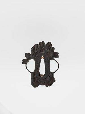 Lot 59 - NAKAI TOMOTSUNE: A RARE CHOSHU SCHOOL IRON TSUBA WITH SAKURA AND BAMBOO