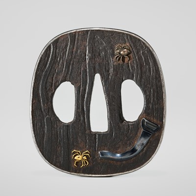 A FINE IRON ‘MOKUME AND SPIDERS’ TSUBA