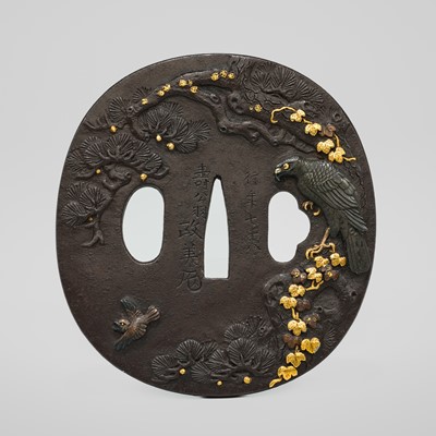 Lot 578 - ISHIGURO MASAYOSHI: A FINE IRON TSUBA WITH A HAWK AND SPARROW, DATED 1852