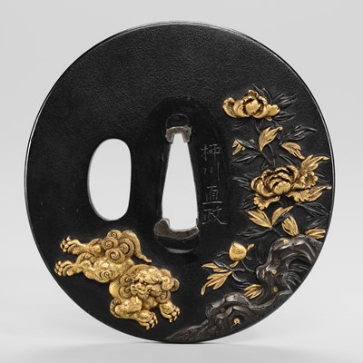Lot 69 - YANAGAWA NAOMASA: A FINE YANAGAWA SCHOOL SHAKUDO TSUBA WITH SHISHI AND PEONIES