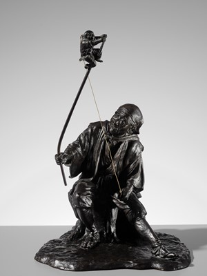 Lot 1 - GENRYUSAI SEIYA: A HUMOROUS AND LARGE BRONZE OKIMINO OF A SARUMAWASHI WITH MONKEY