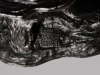 Lot 1 - GENRYUSAI SEIYA: A HUMOROUS AND LARGE BRONZE OKIMINO OF A SARUMAWASHI WITH MONKEY