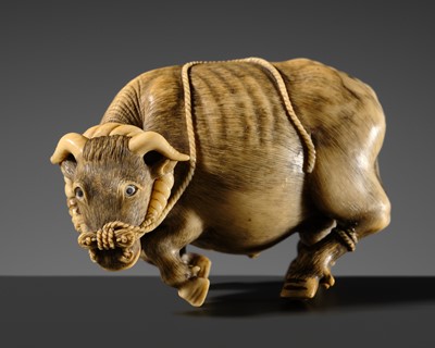 A VERY FINE MARINE IVORY OKIMONO OF AN OX