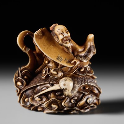 Lot 454 - A FINE OSAKA SCHOOL IVORY NETSUKE OF TSURU SENNIN