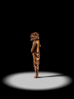 Lot 87 - A SUPERB TALL WOOD NETSUKE OF RYUJIN’S ATTENDANT