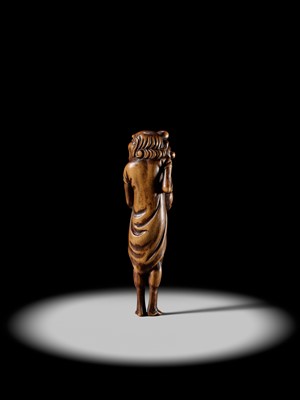 Lot 87 - A SUPERB TALL WOOD NETSUKE OF RYUJIN’S ATTENDANT