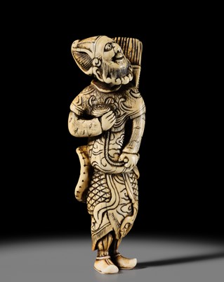 A POWERFUL TALL IVORY NETSUKE OF A TARTAR ARCHER