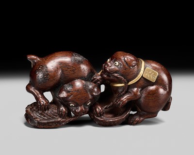 Lot 508 - TANSAI: A LARGE AND UNUSUAL WOOD AND MARINE IVORY NETSUKE OF TWO PUPPIES