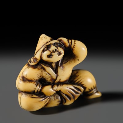 A SUPERB IVORY NETSUKE OF A SEATED TARTAR, ATTRIBUTED TO OTOMAN