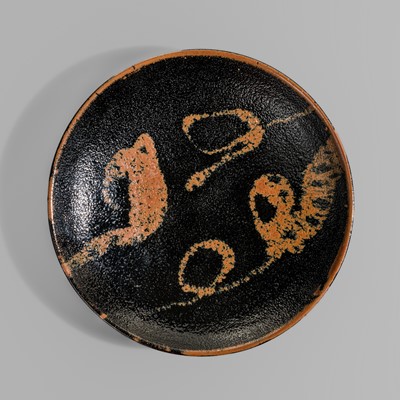 Lot 238 - HAMADA SHOJI: A SUPERB BLACK AND IRON-RUST GLAZED TENMOKU-GLAZED STONEWARE DISH