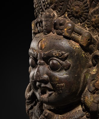 Lot 22 - A WOOD MASK DEPICTING BHAIRAVA, NEPAL, 16TH-17TH CENTURY