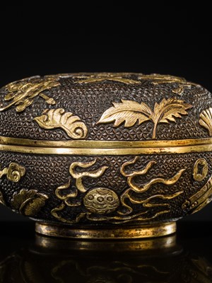 A FINE PARCEL-GILT BRONZE INCENSE POWDER BOX AND COVER, MING DYNASTY