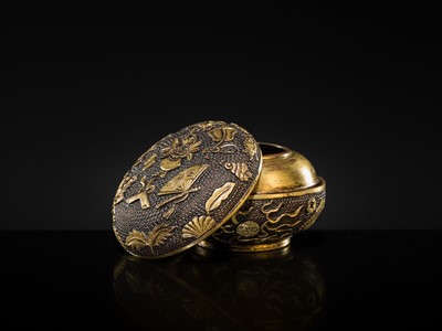 A FINE PARCEL-GILT BRONZE INCENSE POWDER BOX AND COVER, MING DYNASTY