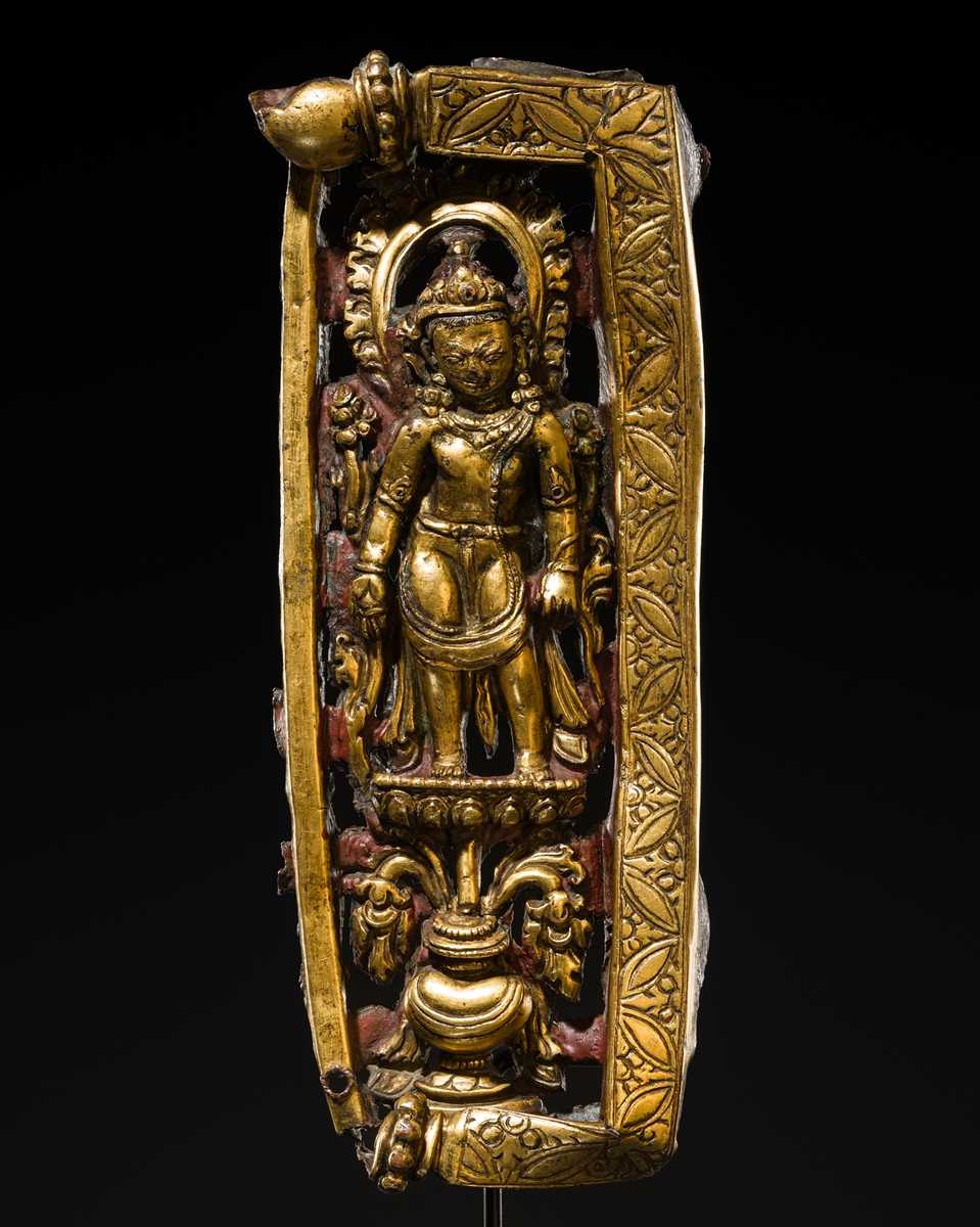 A GILT-COPPER REPOUSSÉ RELIEF DEPICTING PADMAPANI LOKESHVARA, TIBET, 14TH-15TH CENTURY