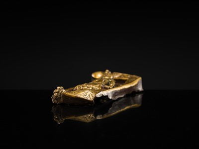 A GILT-COPPER REPOUSSÉ RELIEF DEPICTING PADMAPANI LOKESHVARA, TIBET, 14TH-15TH CENTURY