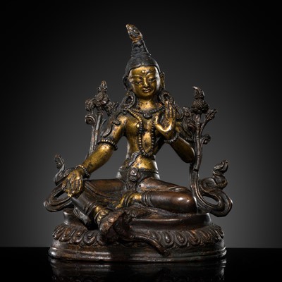 Lot 310 - A PARCEL-GILT BRONZE FIGURE OF GREEN TARA, NEPAL, 16TH-17TH CENTURY