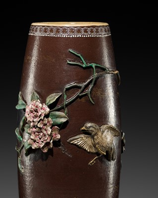 A LARGE KOZAN STYLE RELIEF-MOULDED EARTHENWARE VASE WITH CAMELLIA AND SPARROW