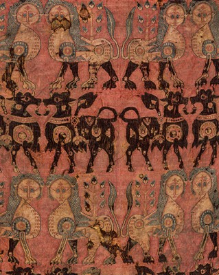 Lot 197 - AN ANCIENT AND VERY RARE SILK FRAGMENT WITH CONFRONTING LIONS AND BULLS, SOGDIANA, CIRCA 650 AD