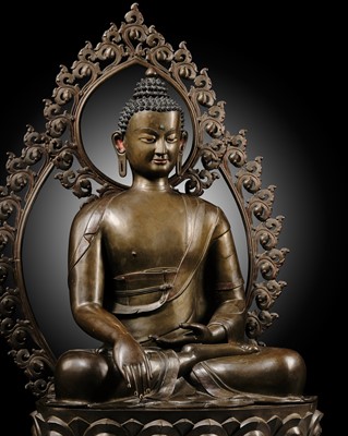Lot 31 - A LARGE (111 CM) AND MASSIVELY CAST BRONZE FIGURE OF BUDDHA SHAKYAMUNI, NEPAL, 18TH CENTURY