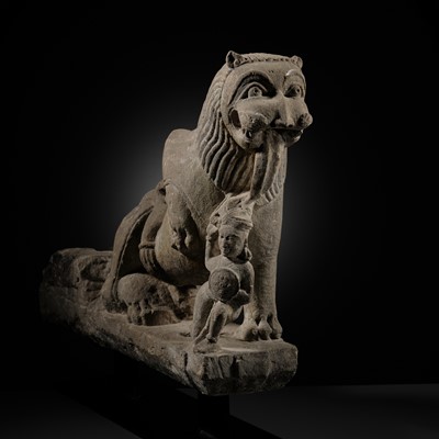 Lot 207 - A SANDSTONE CARVING OF A LION SUBDUING A WARRIOR, CHANDELA DYNASTY