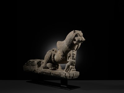 Lot 207 - A SANDSTONE CARVING OF A LION SUBDUING A WARRIOR, CHANDELA DYNASTY