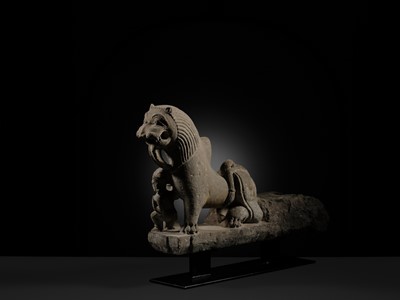Lot 207 - A SANDSTONE CARVING OF A LION SUBDUING A WARRIOR, CHANDELA DYNASTY