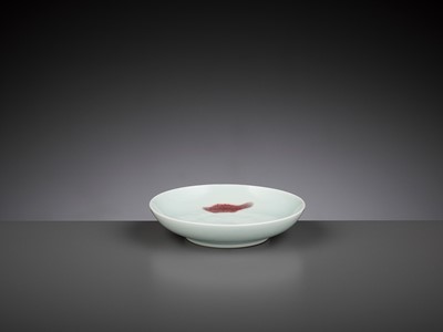 Lot 252 - A COPPER-RED ‘THREE-FISH’ DISH, YONGZHENG MARK AND PERIOD