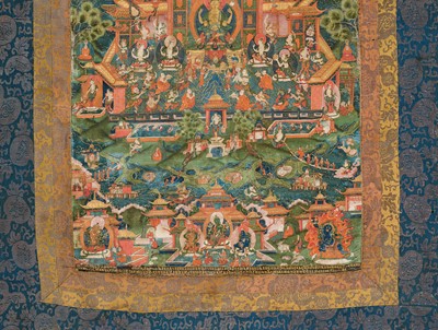 Lot 42 - A THANGKA DEPICTING SHADAKSHARI LOKESHVARA IN HIS POTALA PURE LAND, 18TH CENTURY