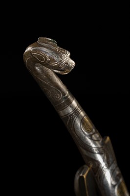 Lot 42 - A GOLD AND SILVER-INLAID BRONZE BELT HOOK, WARRING STATES-HAN DYNASTY