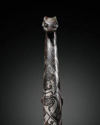 Lot 63 - A SILVER-INLAID BRONZE GARMENT HOOK, DAIGOU, WARRING STATES-HAN DYNASTY