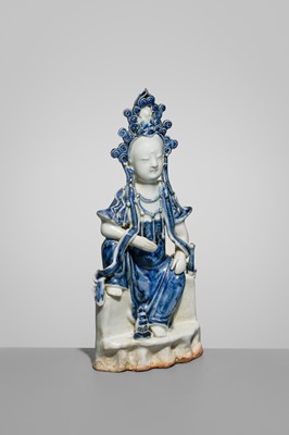 Lot 1585 - AN UNDERGLAZE BLUE PORCELAIN FIGURE OF KANNON BOSATSU